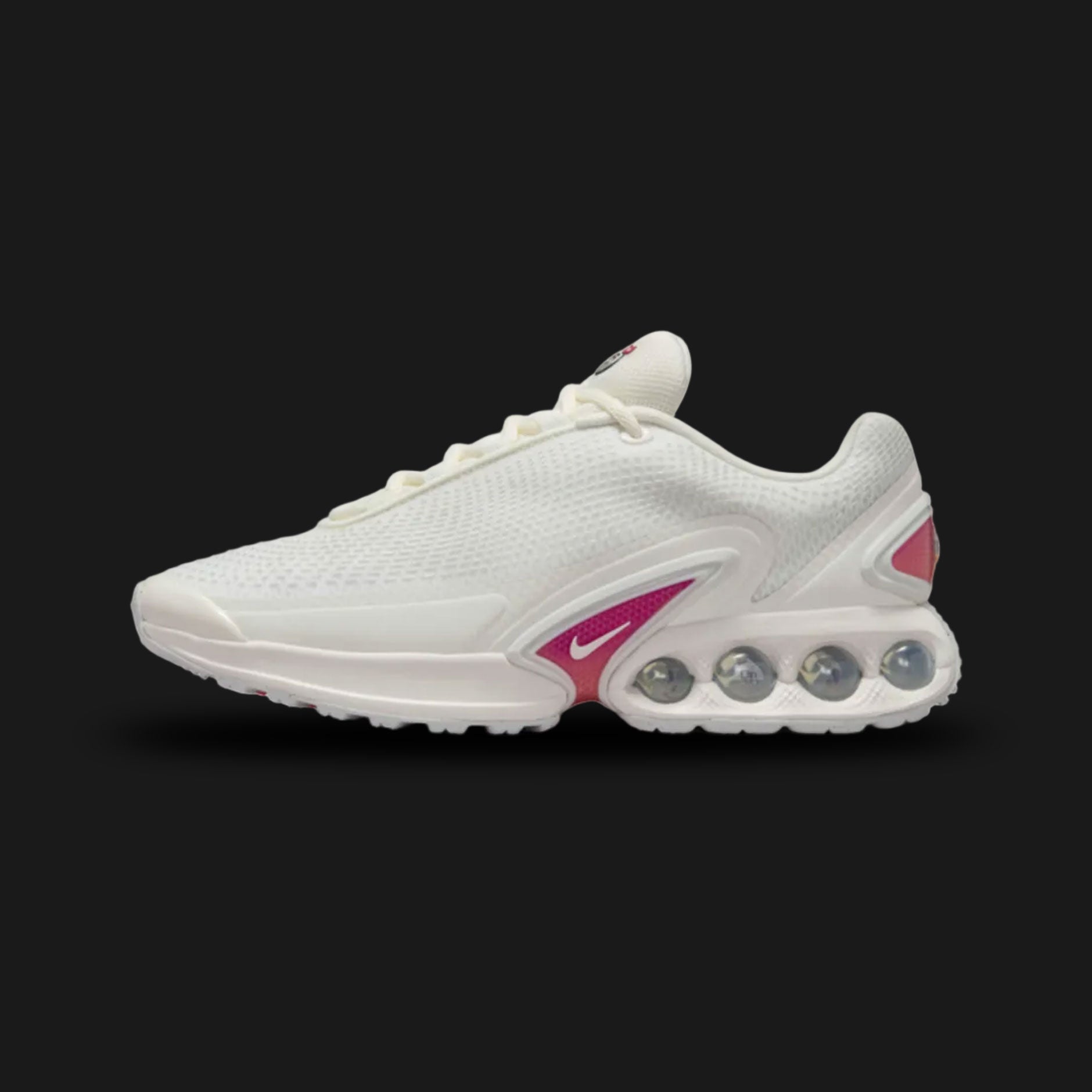Nike Air Max Dn in Sail, Phantom, and Hyper Violet (FJ3145-103). Features a haptic textured Sail upper with a high-contrast Hyper Violet Dynamic Air four-tube system in the heel. Accented by Metallic Silver shanks. Luxuntique offers 100% authentic Nike footwear in Sri Lanka.