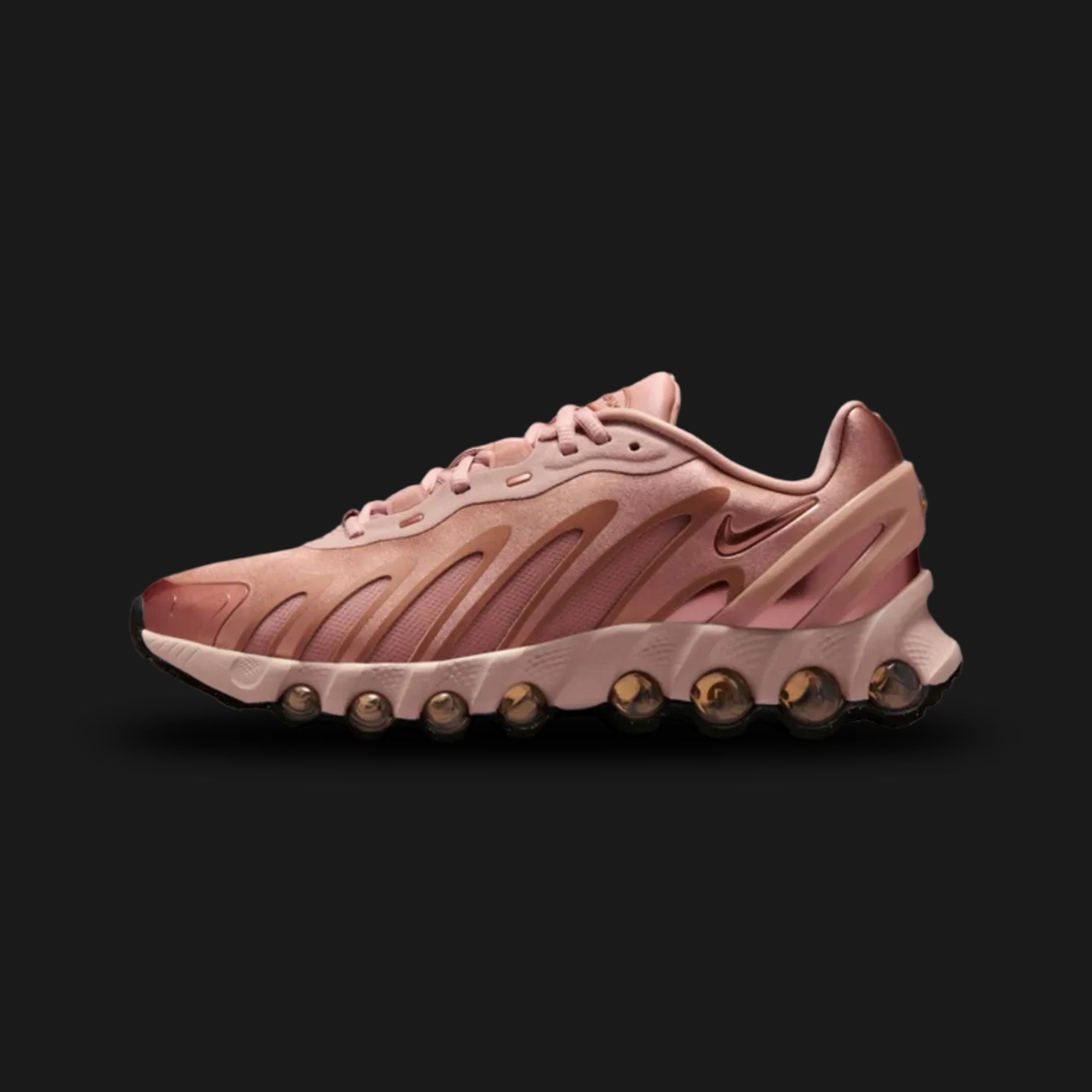 Nike Air Max Dn8 in Metallic Red Bronze, Particle Beige, and Hemp (HF5509-900). Features a multi-layered textured upper with a striking Metallic Red Bronze finish. Showcases the advanced eight-chamber Dynamic Air cushioning system in the heel. Luxuntique offers 100% authentic Nike footwear in Sri Lanka.