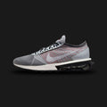 Nike Air Max Flyknit Racer lifestyle shoes in Wolf Grey, Black, Dark Grey, and White (Design Code: FD4610-001). Featuring a featherweight, form-fitting Flyknit upper seamlessly blending Wolf Grey and Black yarns for a dynamic gradient aesthetic. Accented with sleek black synthetic leather eyestays and a crisp White Swoosh. Supported by a modernized foam midsole featuring a cored-out, visible Air Max heel unit for supreme cushioning. Luxuntique offers 100% authentic Nike Air Max sneakers at the lowest price 
