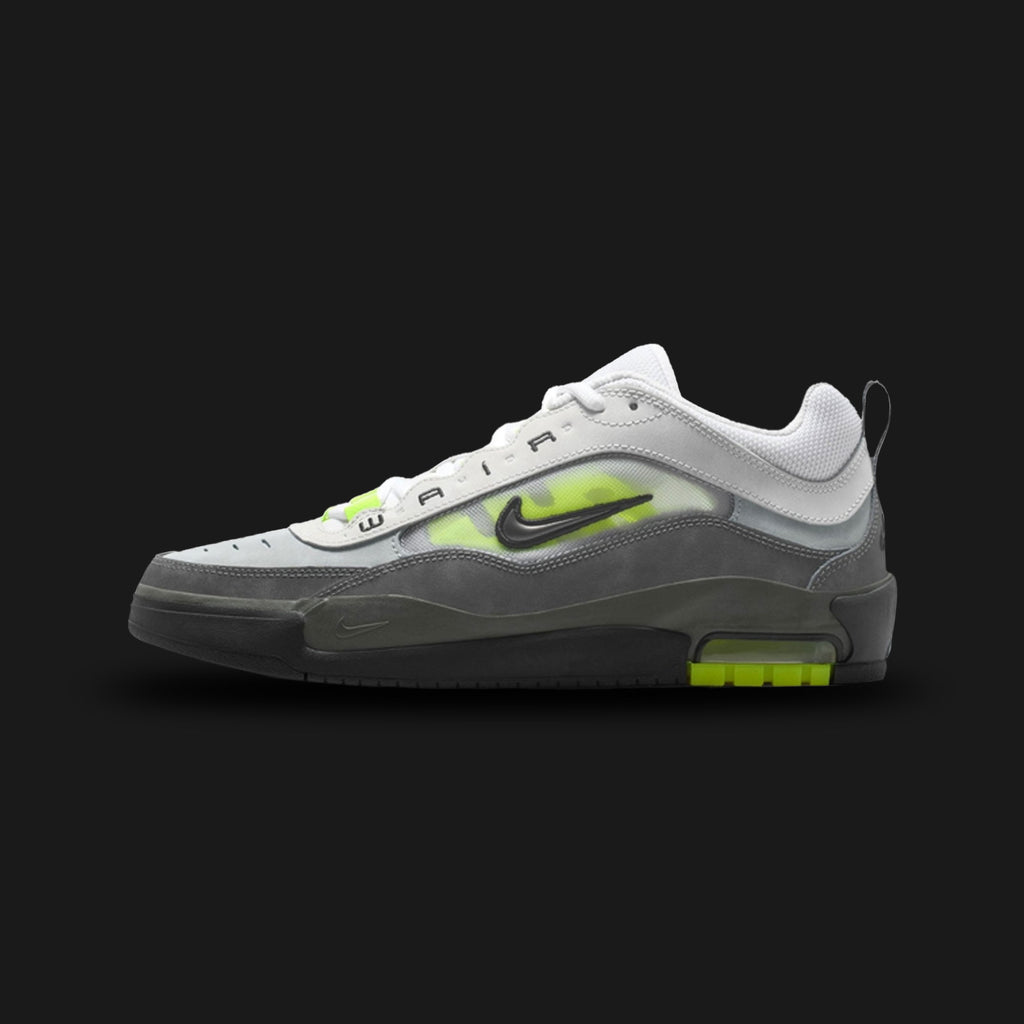 Nike Air Max Ishod skate shoes in Black, Neon Yellow, Anthracite, and Light Graphite (IR1887-002). Features a durable mixed-material upper combining stealthy Black suede and Anthracite breathable mesh inspired by '90s basketball aesthetics. Includes a visible Max Air heel unit for impact protection, striking Neon Yellow accents, and a flexible rubber cupsole. Luxuntique offers 100% authentic Nike in Sri Lanka.