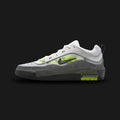 Nike Air Max Ishod skate shoes in Black, Neon Yellow, Anthracite, and Light Graphite (IR1887-002). Features a durable mixed-material upper combining stealthy Black suede and Anthracite breathable mesh inspired by '90s basketball aesthetics. Includes a visible Max Air heel unit for impact protection, striking Neon Yellow accents, and a flexible rubber cupsole. Luxuntique offers 100% authentic Nike in Sri Lanka.