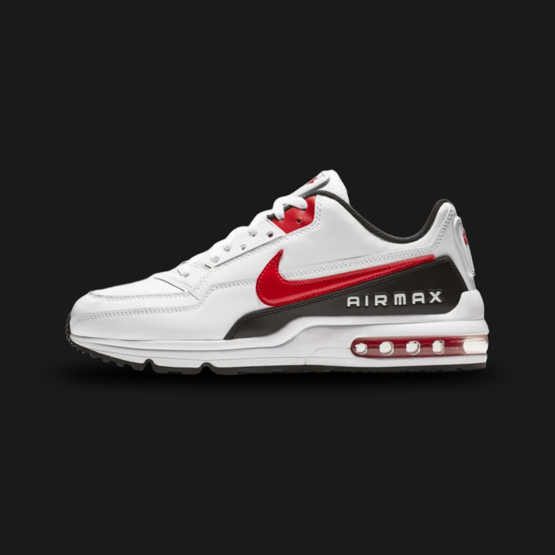 Nike Air Max LTD 3 everyday lifestyle shoes in White, Black, and University Red (Design Code: BV1171-100). Featuring a highly durable crisp White upper crafted from real and synthetic leather for a classic, structured fit. Accented with bold Black Swooshes and vibrant University Red detailing on the eyelets and branding. Supported by a solid foam midsole and a prominent, wraparound Max Air unit in the heel for heavy-duty cushioning. Luxuntique offers 100% authentic Nike Air Max sneakers at the lowest price 