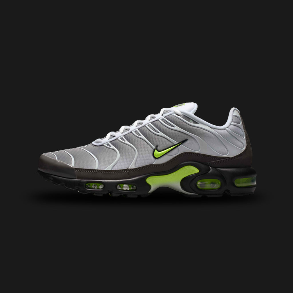 Nike Air Max Plus shoes in White, Pearl Grey, Black, and Neon Yellow (IQ0288-100). Features a breathable White and Pearl Grey mesh upper encased in the iconic wavy TPU overlays inspired by palm trees. Includes high-voltage Neon Yellow branding accents, visible Tuned Air (TN) cushioning units housed in a Black foam midsole, and a prominent midfoot arch. Luxuntique guarantees 100% authentic Nike footwear in Sri Lanka.