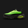 Nike Air Max Portal in Black, Green Strike, and Volt (HF3053-013). Features a breathable black mesh upper with wavy synthetic overlays, a thick sculpted foam midsole, and visible Air Max cushioning in the heel. Accented by vibrant neon Green Strike branding and Volt details.