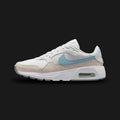 Nike Air Max SC women's shoes in Summit White, Light Orewood Brown, and Light Armoury Blue (Design Code: CW4554-126). Featuring a visible Max Air unit for responsive cushioning, a breathable mesh upper with leather and suede overlays, and a durable rubber outsole with flex grooves. Luxuntique offers 100% authentic Nike Air Max sneakers for women at the lowest price in Sri Lanka.