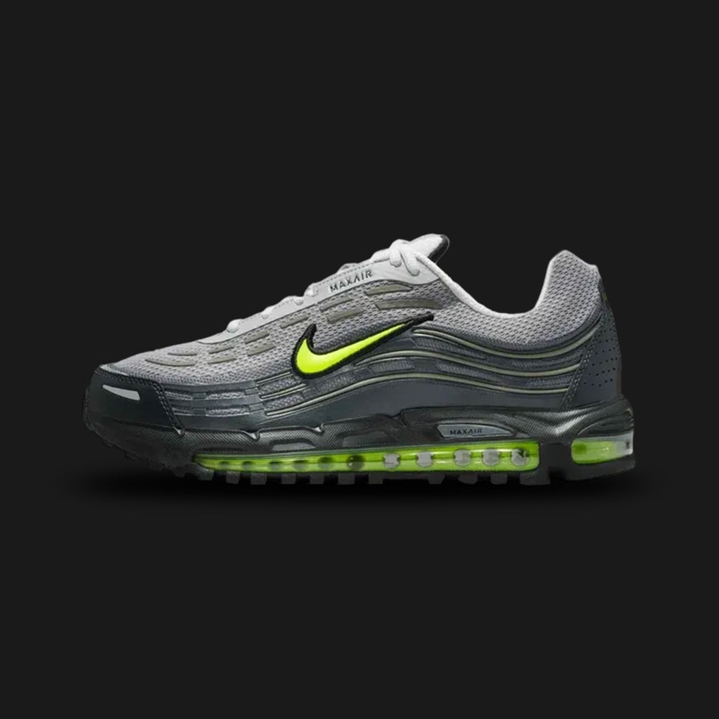 Nike Air Max TL 2.5 shoes in Pearl Grey, Anthracite, and Neon Yellow (Design Code: FZ4110-010). Featuring a layered mesh and synthetic upper transitioning from Pearl Grey to dark Anthracite, accented by vibrant Neon Yellow branding. Supported by a full-length visible Total Air unit for maximum cushioning and a bold 90s tech aesthetic. Luxuntique offers 100% authentic Nike Air Max sneakers at the lowest price in Sri Lanka.