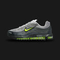 Nike Air Max TL 2.5 shoes in Pearl Grey, Anthracite, and Neon Yellow (Design Code: FZ4110-010). Featuring a layered mesh and synthetic upper transitioning from Pearl Grey to dark Anthracite, accented by vibrant Neon Yellow branding. Supported by a full-length visible Total Air unit for maximum cushioning and a bold 90s tech aesthetic. Luxuntique offers 100% authentic Nike Air Max sneakers at the lowest price in Sri Lanka.