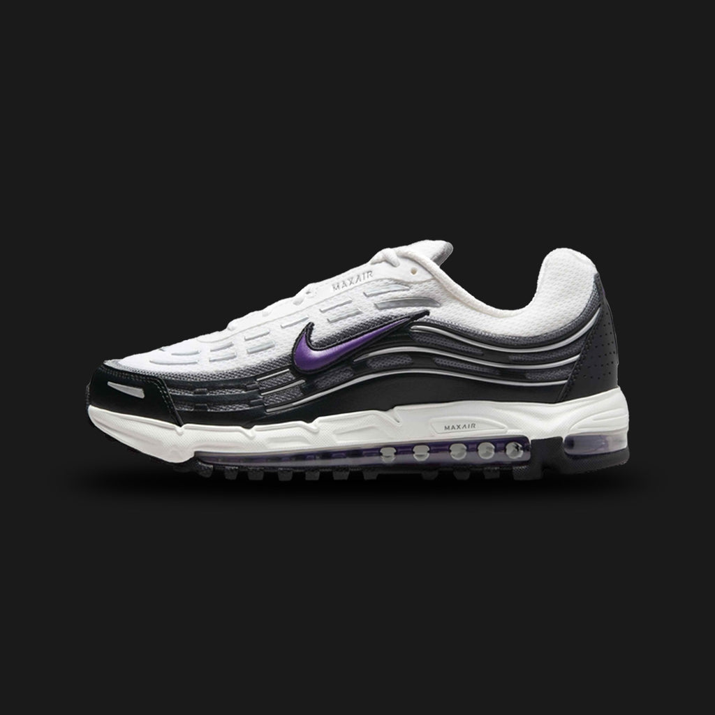 Nike Air Max TL 2.5 shoes in White, Black, Smoke Grey, and Wild Grape (Design Code: FZ4110-105). Featuring a layered White mesh upper with wavy Black and Smoke Grey synthetic overlays for a dynamic, retro-sport look. Accented with vibrant Wild Grape purple details on the Swoosh and tongue, supported by a full-length visible Total Air unit. Luxuntique offers 100% authentic Nike Air Max sneakers at the lowest price in Sri Lanka.