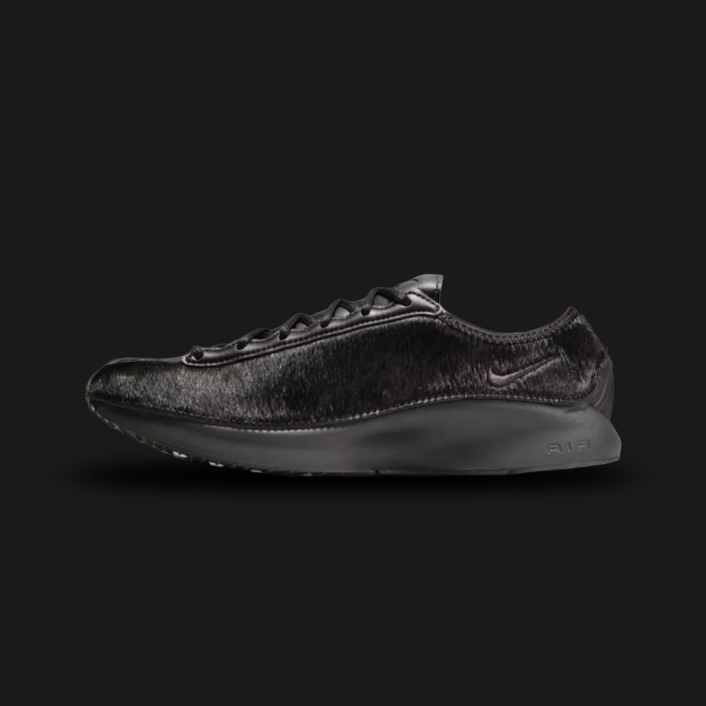 Nike Air Superfly LX in Black, Photon Dust, and Off-Noir (HQ9148-001). Features a premium black pony hair upper with light Photon Dust leather overlays and dark Off-Noir accents. Low-profile archival runner with a signature angular heel and encapsulated Air cushioning.