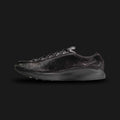 Nike Air Superfly LX in Black, Photon Dust, and Off-Noir (HQ9148-001). Features a premium black pony hair upper with light Photon Dust leather overlays and dark Off-Noir accents. Low-profile archival runner with a signature angular heel and encapsulated Air cushioning.