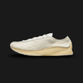 Nike Air Superfly LX in Sail, Soft Yellow, and Muslin (HQ9148-100). Features a premium Sail pony hair upper with Soft Yellow leather overlays and an aged Muslin finish. A low-profile aerodynamic archival runner with a signature angular heel. Luxuntique offers 100% authentic Nike footwear in Sri Lanka.