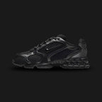Nike Air Zoom Spiridon Cage 2 shoes in Black, Anthracite, and Smoke Grey (Design Code: HM8497-010). Featuring a breathable open-hole mesh upper encased in a glossy, supportive cage overlay for a futuristic tech aesthetic. Equipped with a visible phylite midsole and a Zoom Air unit in the heel for responsive, lightweight cushioning. Luxuntique offers 100% authentic Nike Y2K lifestyle runners at the lowest price in Sri Lanka.