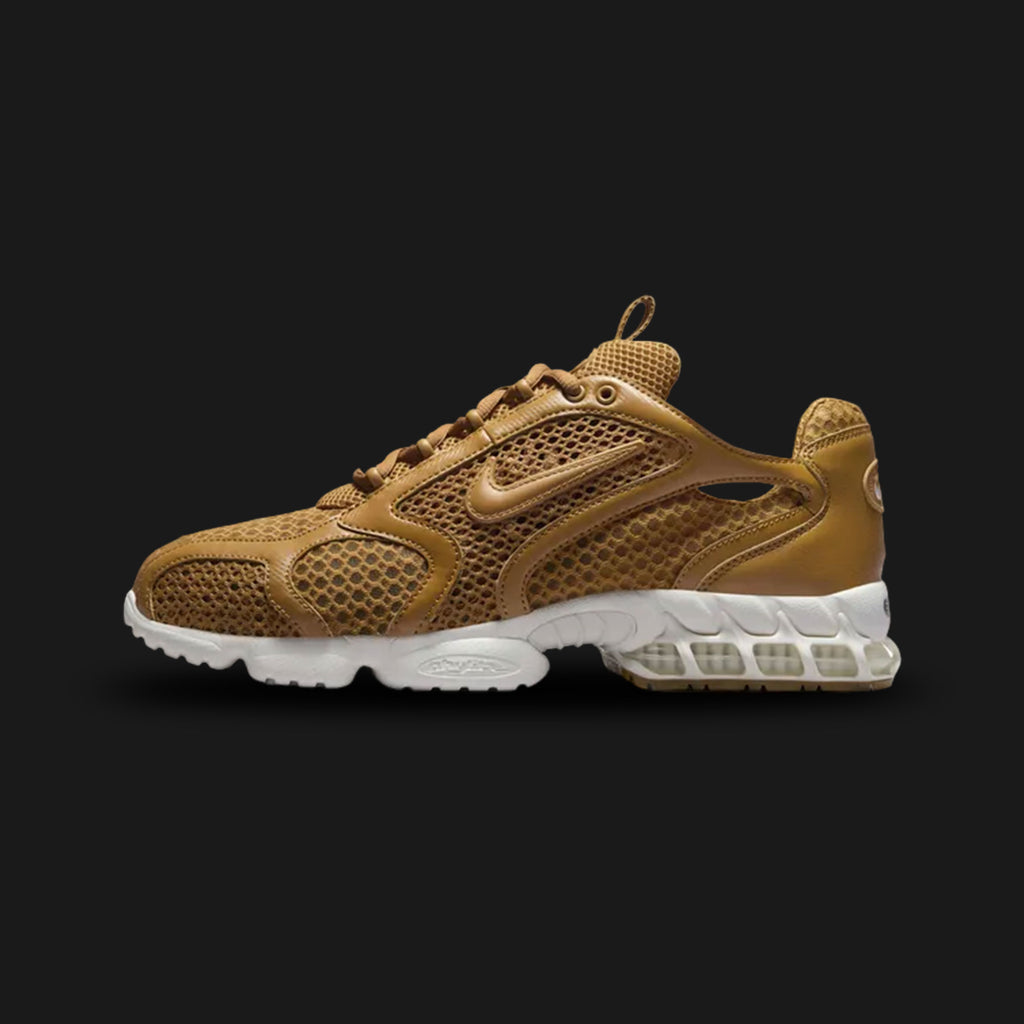 Nike Air Zoom Spiridon Cage 2 shoes in Wheat, Sail, and Gum Light Brown (Design Code: HQ3552-799). Featuring a premium Wheat textile upper with a tonal caged overlay and soft suede details for a rugged, monochromatic look. Equipped with a contrasting Sail midsole housing a Zoom Air unit in the heel and a durable Gum Light Brown rubber outsole. Luxuntique offers 100% authentic Nike lifestyle runners at the lowest price in Sri Lanka.
