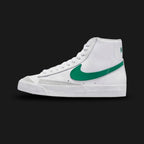 Nike Blazer Mid '77 women's shoes in White, Peach, and Malachite green (Design Code: CZ1055-119). Featuring a vintage-treated leather upper, vibrant peach Swoosh, and Malachite green accents on the heel and tongue. Includes the signature exposed foam tongue and a vulcanized rubber outsole for a classic retro look. Luxuntique offers 100% authentic Nike Blazer sneakers at the lowest price in Sri Lanka.