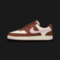 Nike Court Vision Low shoes in Soft Pearl, Fauna Brown, and Pink Foam (IM1652-004). Features a durable basketball-inspired silhouette with a layered leather upper, classic Swoosh details, and a sturdy rubber cupsole for everyday traction. Luxuntique guarantees 100% authentic "Nike" performance footwear in Sri Lanka.
