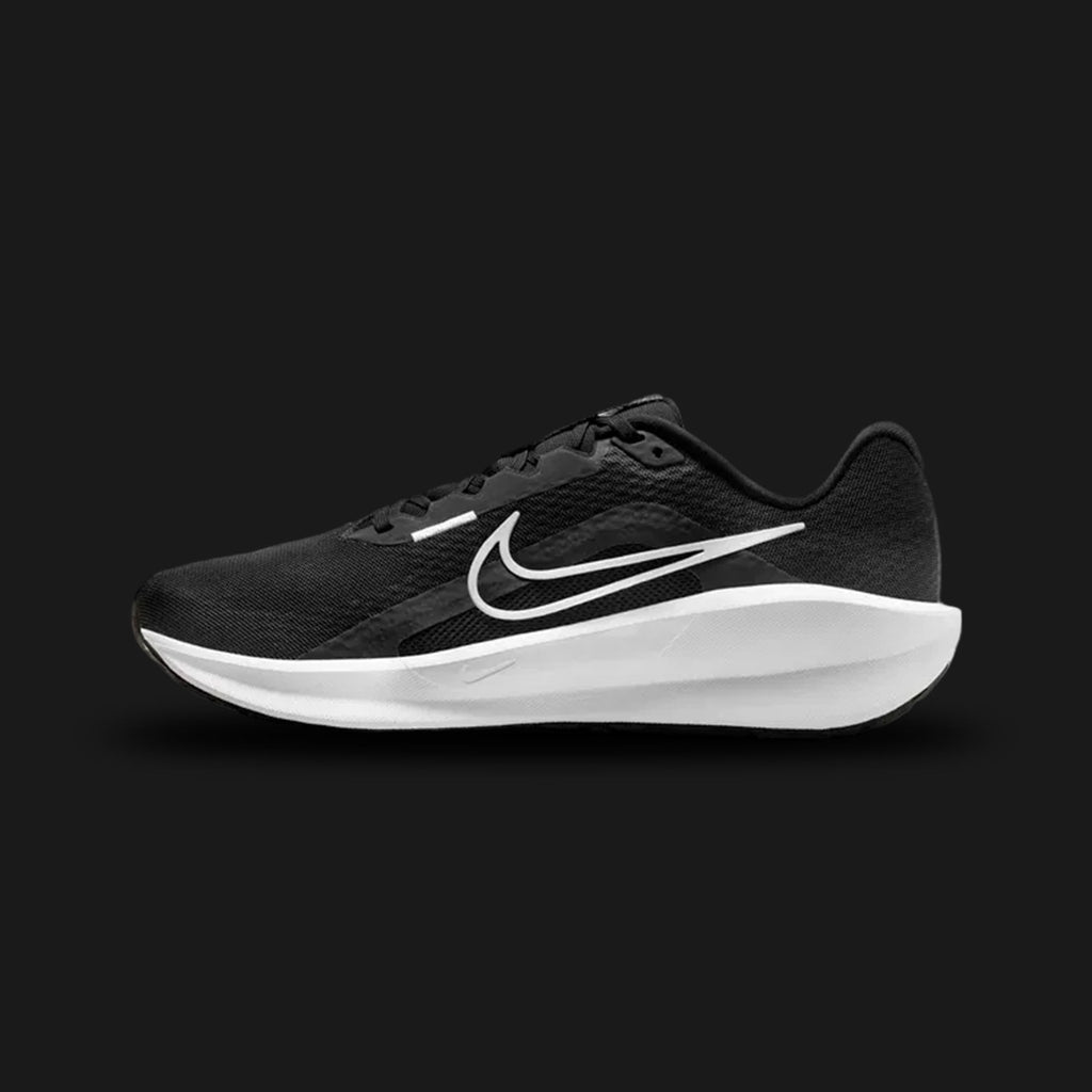 Nike Downshifter 13 men's road running shoes in Black and White (Design Code: FD6454-001). Featuring a breathable mesh upper, a supportive foam midsole for lightweight cushioning, and a durable rubber outsole made with at least 13% Nike Grind. Luxuntique offers 100% authentic Nike sneakers at the lowest price in Sri Lanka.