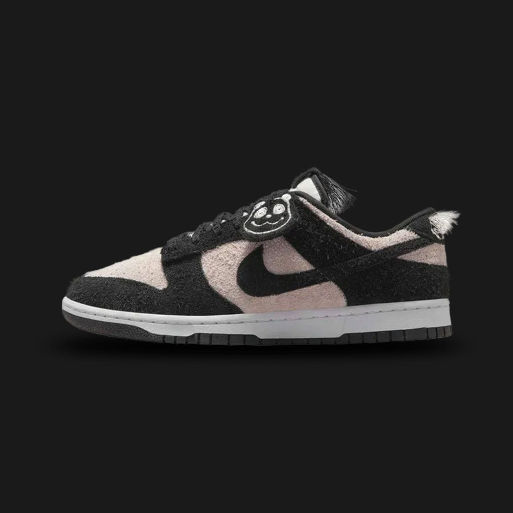 Nike Dunk Low Retro SE men's shoes in White and Black (Design Code: IB2990-100). Featuring a premium leather upper with classic color blocking, a padded low-cut collar for comfort, and a crisp white midsole. Includes a durable rubber outsole with the classic hoops pivot circle. Luxuntique offers 100% authentic Nike Dunk Retro sneakers at the lowest price in Sri Lanka.