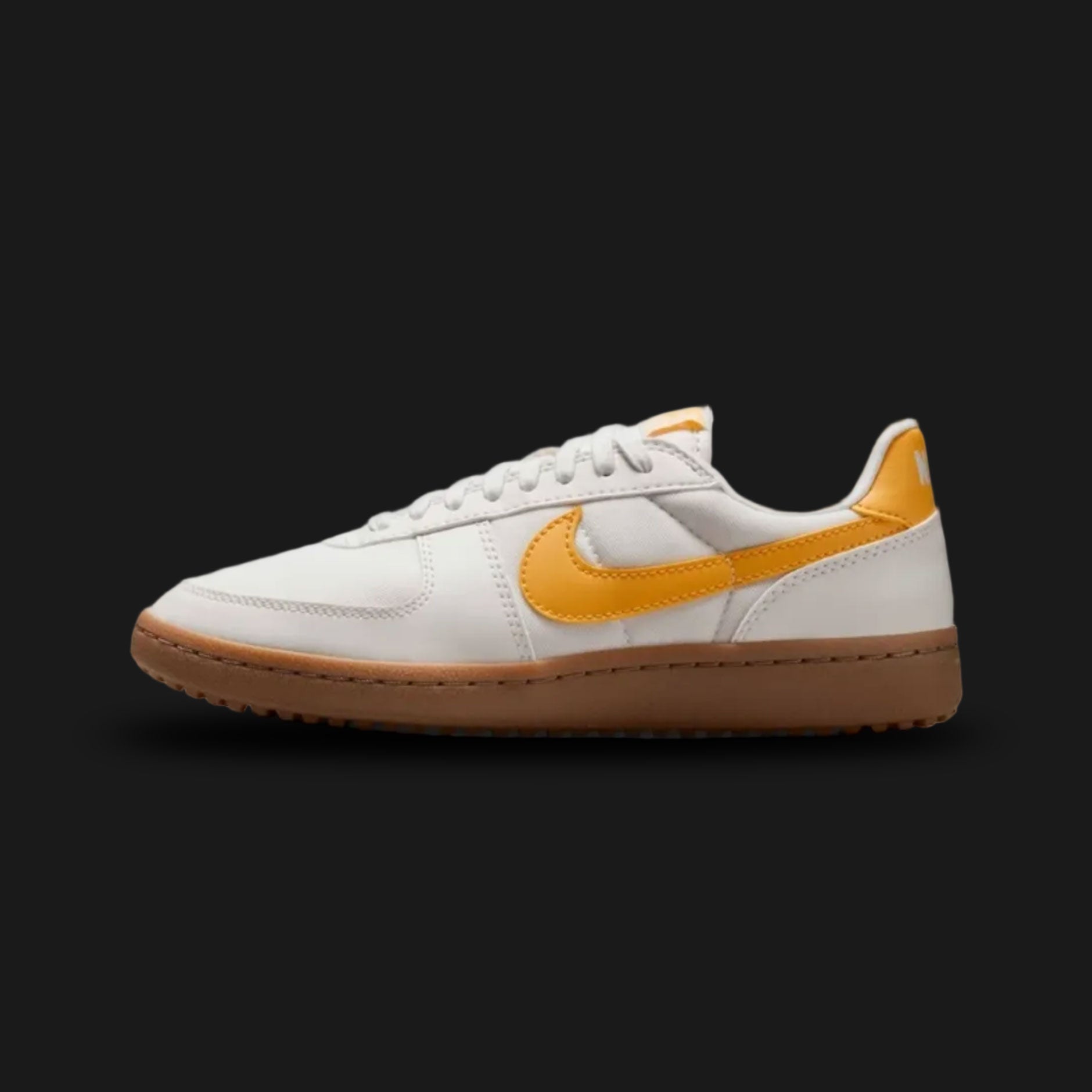 Nike Field General '82 vintage lifestyle shoes in Phantom, Gum Dark Brown, and Solar Flare (Design Code: FZ5593-003). Featuring a retro-inspired Phantom off-white nylon and suede upper for a breathable, classic turf aesthetic. Accented with a vibrant Solar Flare yellow leather Swoosh and heel tab. Securely built on a rugged, dark brown gum rubber waffle outsole originally designed for gridiron traction. Luxuntique offers 100% authentic Nike retro footwear at the lowest price in Sri Lanka.