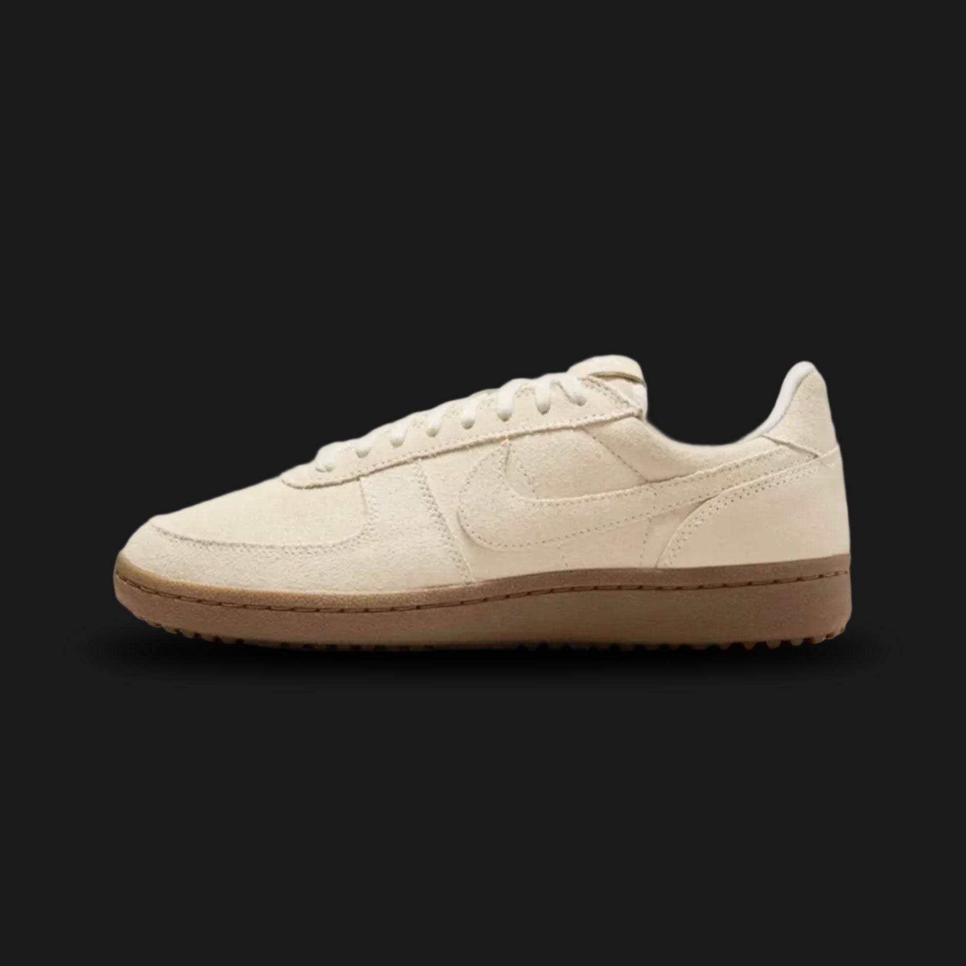 Nike Field General Suede vintage lifestyle shoes in Soft Pearl and Gum Dark Brown (Design Code: IO1913-047). Featuring a premium, tonal Soft Pearl suede upper for an elevated, retro turf aesthetic. Accented with matching Soft Pearl details on the leather Swoosh and laces, all securely built on a rugged, dark brown gum rubber waffle outsole originally designed for classic gridiron traction. Luxuntique offers 100% authentic Nike retro footwear at the lowest price in Sri Lanka.