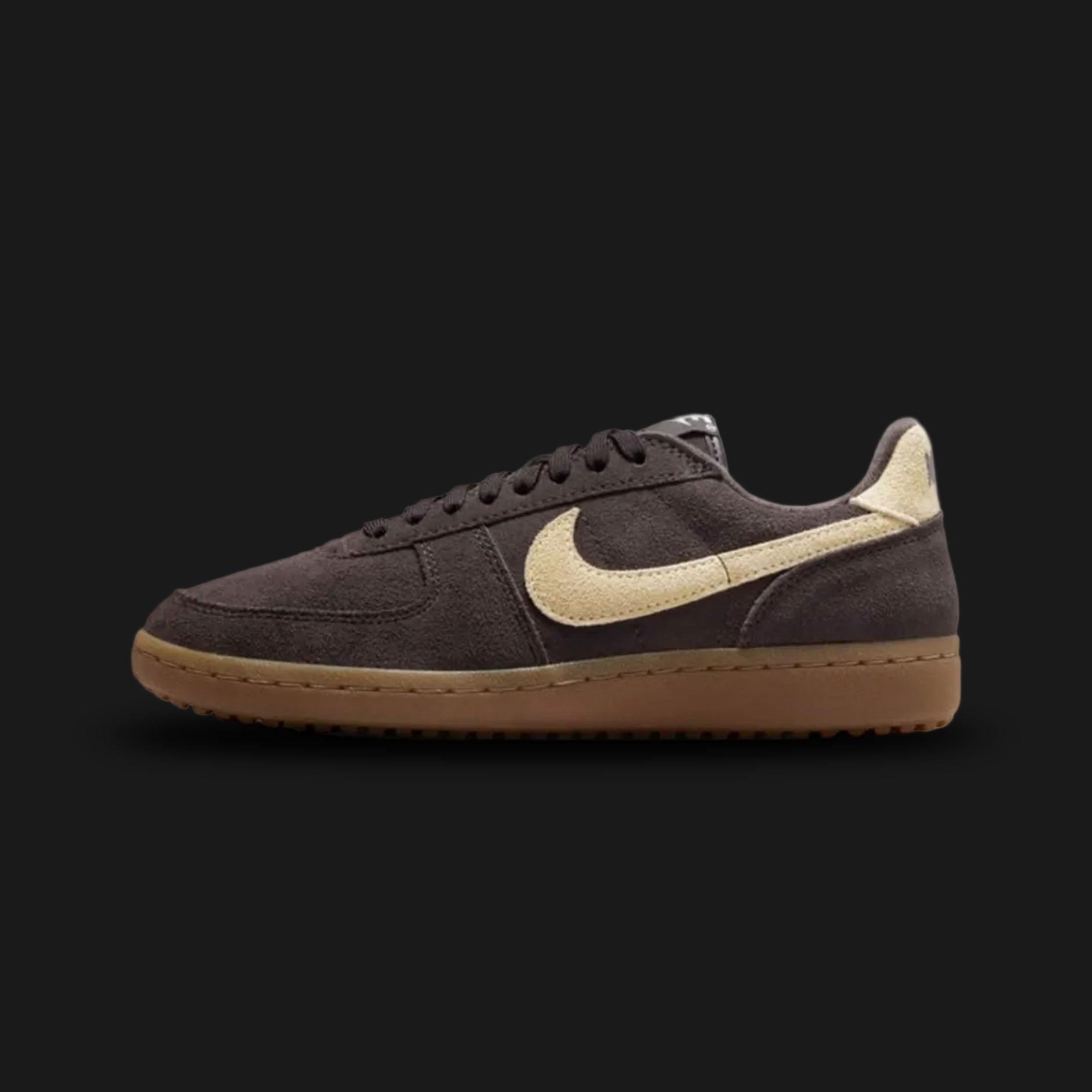 Nike Field General Suede vintage lifestyle shoes in Velvet Brown, Gum Dark Brown, and Alabaster (Design Code: IF1743-202). Featuring a premium, richly textured Velvet Brown suede upper that offers a luxurious, earthy take on the classic turf aesthetic. Accented by a smooth, contrasting Alabaster off-white leather Nike Swoosh and heel tab. Securely built on a rugged, Gum Dark Brown rubber waffle outsole originally designed for gridiron traction. Luxuntique offers 100% authentic Nike retro footwear at the low