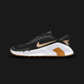Nike Flex Train shoes in Black, White, and Parachute Beige (HV9972-002). Features a highly breathable Black mesh upper with structural overlays and a crisp White Swoosh. Includes premium Parachute Beige accents, a flexible foam midsole with deep flex grooves for natural movement, and durable rubber traction. Luxuntique offers 100% authentic Nike in Sri Lanka.