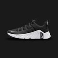 Nike Free Metcon 7 training shoes in Black, Photon Dust, Anthracite, and White (II7405-002). Features a breathable Black and Anthracite chain-link mesh upper with stark White and Photon Dust accents. Includes a wide, stable heel for heavy lifting and a grooved Nike Free forefoot for explosive agility. Luxuntique offers 100% authentic Nike in Sri Lanka.
