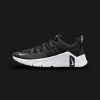 Nike Free Metcon 7 training shoes in Black, Photon Dust, Anthracite, and White (II7405-002). Features a breathable Black and Anthracite chain-link mesh upper with stark White and Photon Dust accents. Includes a wide, stable heel for heavy lifting and a grooved Nike Free forefoot for explosive agility. Luxuntique offers 100% authentic Nike in Sri Lanka.
