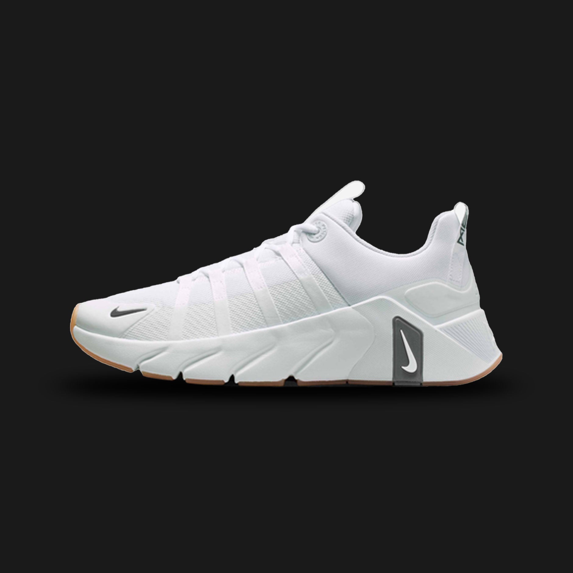Nike Free Metcon 7 training shoes in White, Iron Grey, and Gum Yellow (II7405-101). Features a breathable White chain-link mesh upper with durable synthetic overlays. Includes a wide, stable Iron Grey heel for heavy lifting and a Nike Free forefoot for explosive agility, finished with a high-traction Gum Yellow rubber outsole. Luxuntique offers 100% authentic Nike in Sri Lanka.