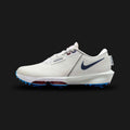 Nike Infinity Tour 2 performance shoe in White, Photon Dust, and Blue Void (Design Code: NKHQ3052-100). Featuring two Air Zoom units for energy return, integrated traction spikes, and a breathable Flyweave upper. Luxuntique offers 100% authentic Nike performance footwear at the lowest price in Sri Lanka.