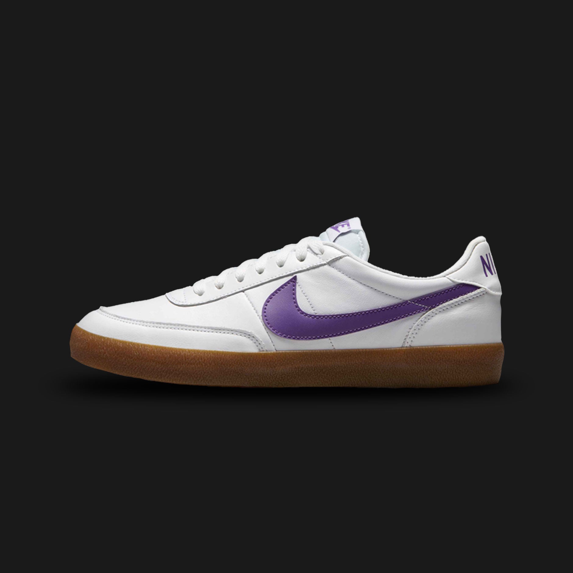 Nike Killshot 2 Leather shoes in White, Gum Medium Brown, and Wild Grape (Design Code: HM9431-101). Featuring a premium white leather upper with soft grey suede overlays on the toe and heel, contrasted by a striking Wild Grape purple Swoosh. Finished with a vintage-inspired gum rubber outsole for superior traction and classic tennis style. Luxuntique offers 100% authentic Nike lifestyle sneakers at the lowest price in Sri Lanka.