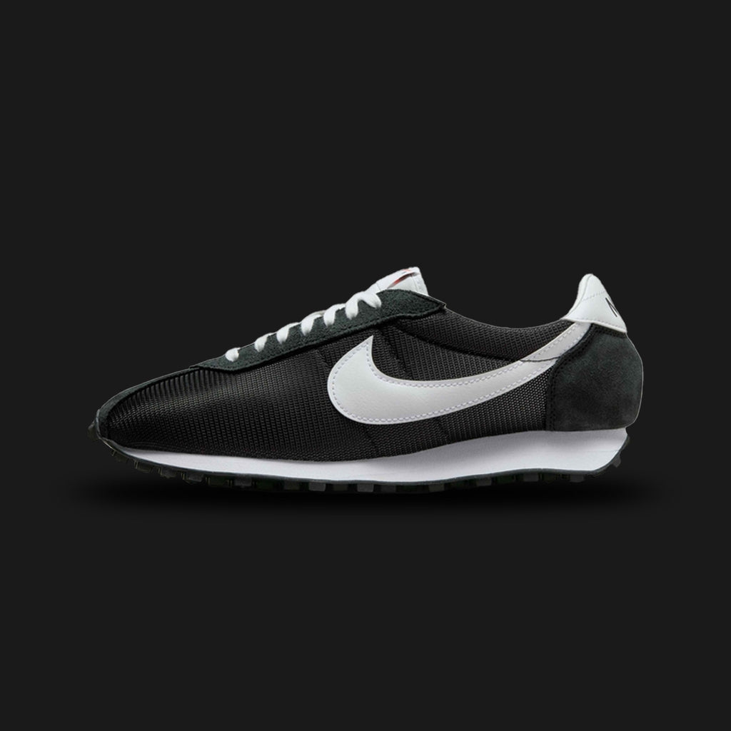 Nike LD-1000 vintage running shoes in Black and White (Design Code: HJ4687-002). Featuring a breathable black mesh upper with premium suede overlays and a crisp white leather Swoosh. Built on a flared heel midsole with the iconic black Waffle rubber outsole for superior traction and heritage style. Luxuntique offers 100% authentic Nike retro sneakers at the lowest price in Sri Lanka.