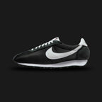 Nike LD-1000 vintage running shoes in Black and White (Design Code: HJ4687-002). Featuring a breathable black mesh upper with premium suede overlays and a crisp white leather Swoosh. Built on a flared heel midsole with the iconic black Waffle rubber outsole for superior traction and heritage style. Luxuntique offers 100% authentic Nike retro sneakers at the lowest price in Sri Lanka.