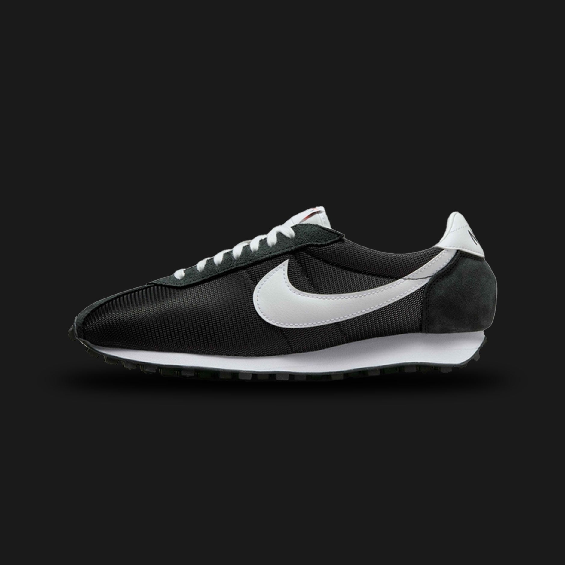 Nike LD-1000 vintage running shoes in Black and White (Design Code: HJ4687-002). Featuring a breathable black mesh upper with premium suede overlays and a crisp white leather Swoosh. Built on a flared heel midsole with the iconic black Waffle rubber outsole for superior traction and heritage style. Luxuntique offers 100% authentic Nike retro sneakers at the lowest price in Sri Lanka.