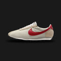 Nike LD-1000 retro running shoes in Coconut Milk, Sail, Black, and Gym Red (Design Code: HF3227-103). Featuring a highly breathable, vintage-tinted Coconut Milk mesh upper layered with warm Sail suede overlays. Accented by a bold Black Nike Swoosh and striking Gym Red heritage branding on the tongue and heel. Anchored by a retro Sail foam midsole with the signature 1970s flared heel, all securely resting on a heavy-duty Waffle rubber outsole. Luxuntique offers 100% authentic Nike retro footwear at the lowes