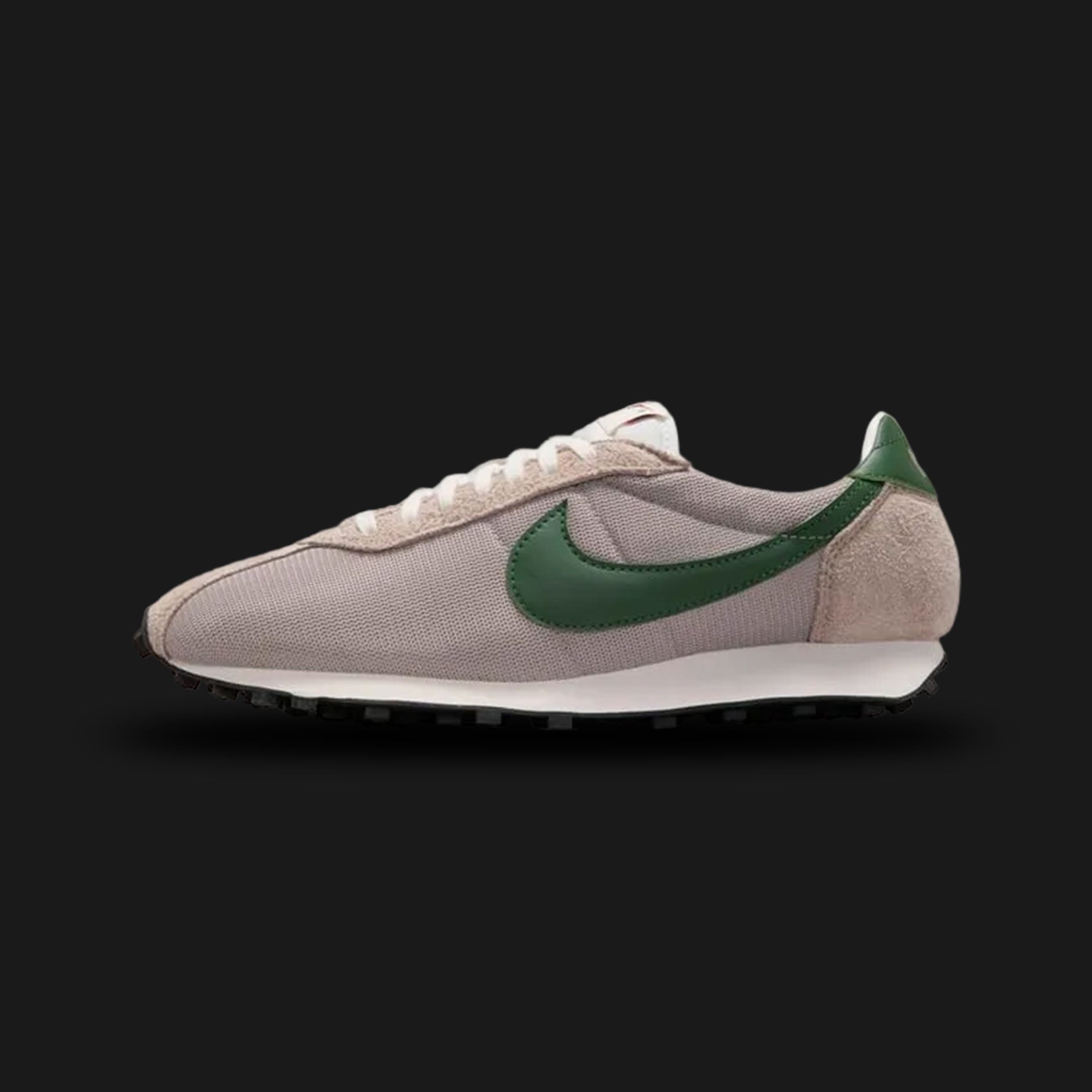 Nike LD-1000 vintage running shoes in College Grey, Fir, and Sail (Design Code: HJ4687-003). Featuring a heritage-inspired mesh and suede upper in College Grey, accented by a deep Fir green leather Swoosh and heel tab. Built on a vintage-effect Sail midsole with the iconic black Waffle rubber outsole for timeless track style. Luxuntique offers 100% authentic Nike retro sneakers at the lowest price in Sri Lanka.