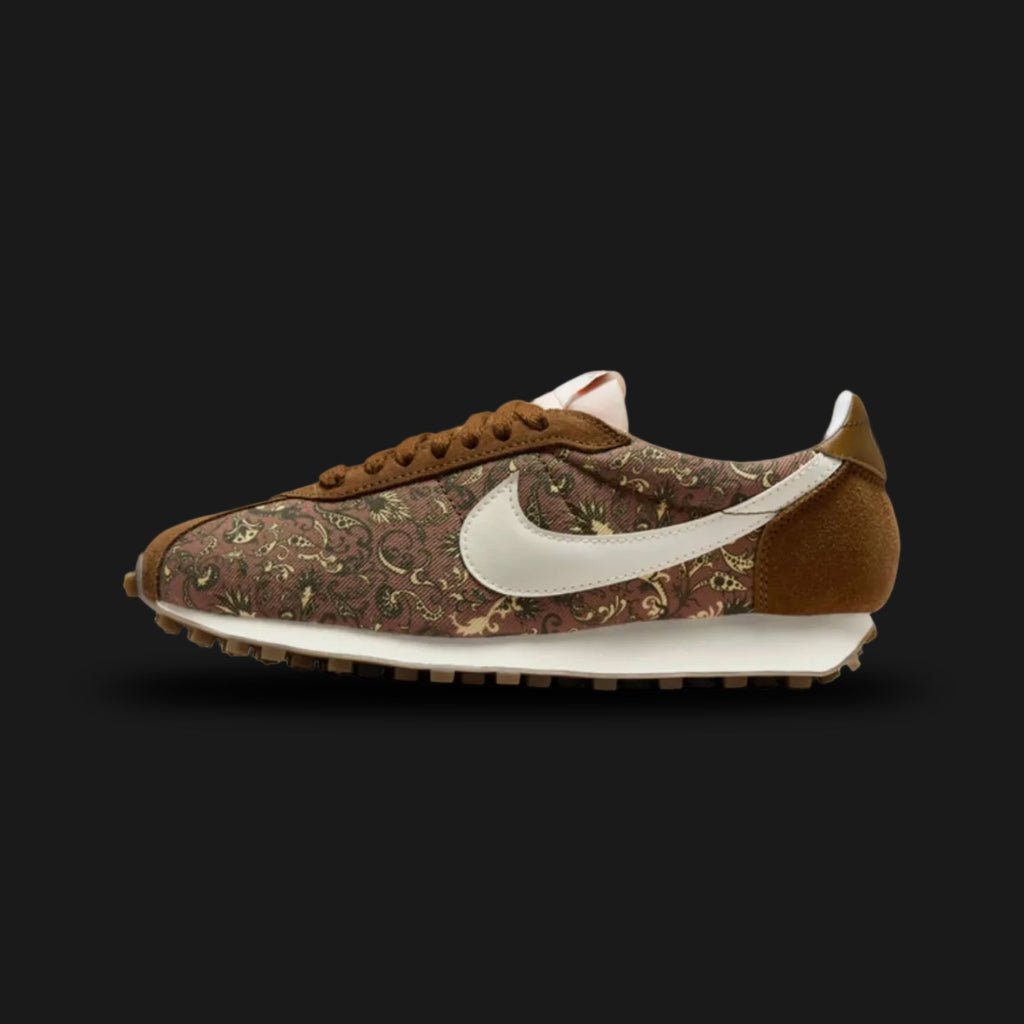 Nike LD-1000 vintage runners in Mosswood Brown, Sesame, and Campfire Orange (IH4479-235). Features a Mosswood Brown mesh upper with Sesame suede overlays and a vibrant Campfire Orange Swoosh. Signature flared heel and Sail waffle outsole. Luxuntique offers 100% authentic Nike footwear in Sri Lanka.