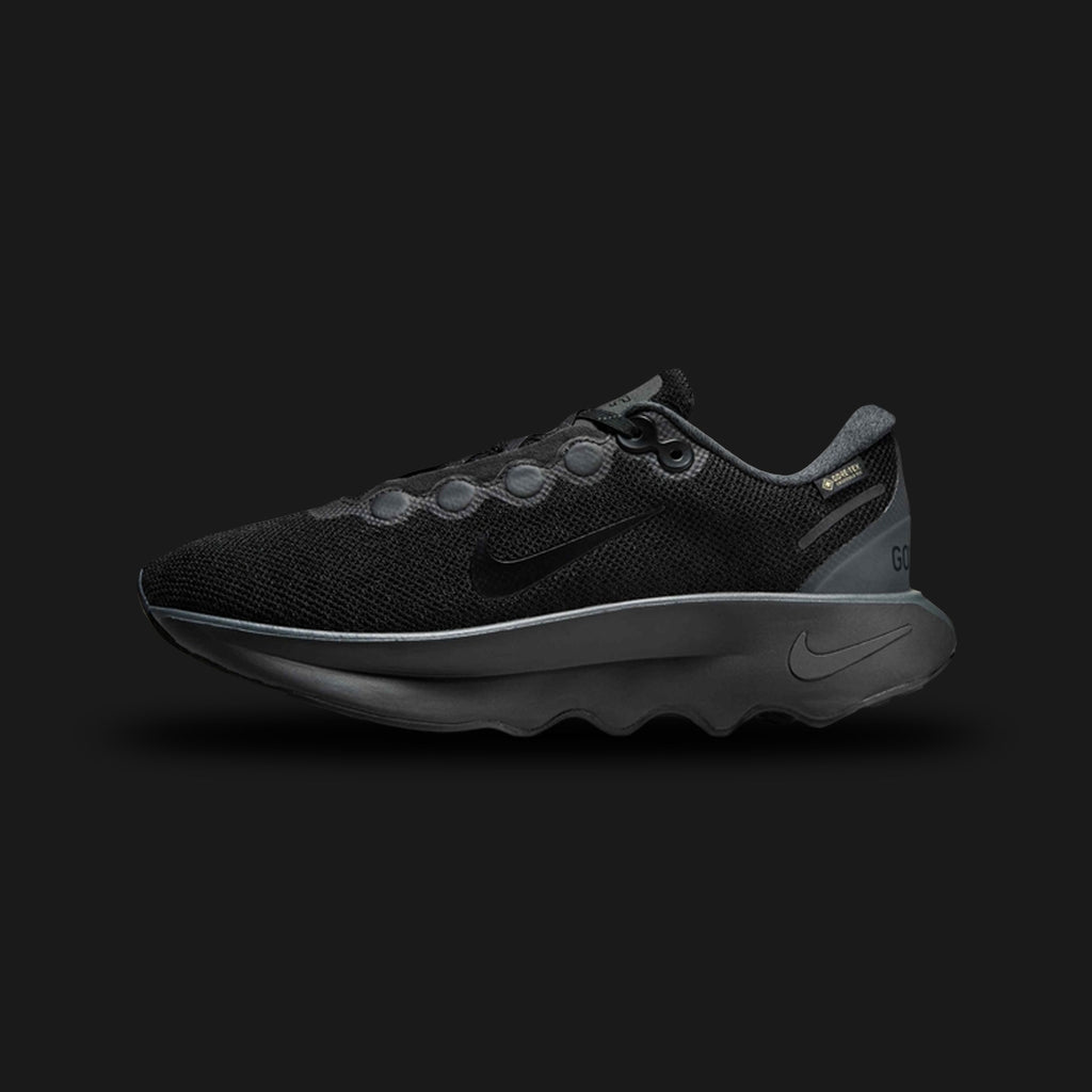 Nike Motiva GORE-TEX shoes in Black and Anthracite (HM0355-001). Features a waterproof GORE-TEX membrane, an exaggerated rocker sole for smooth movement, and soft Comfortgroove foam cushioning. Luxuntique guarantees 100% authentic "Nike" performance footwear in Sri Lanka.