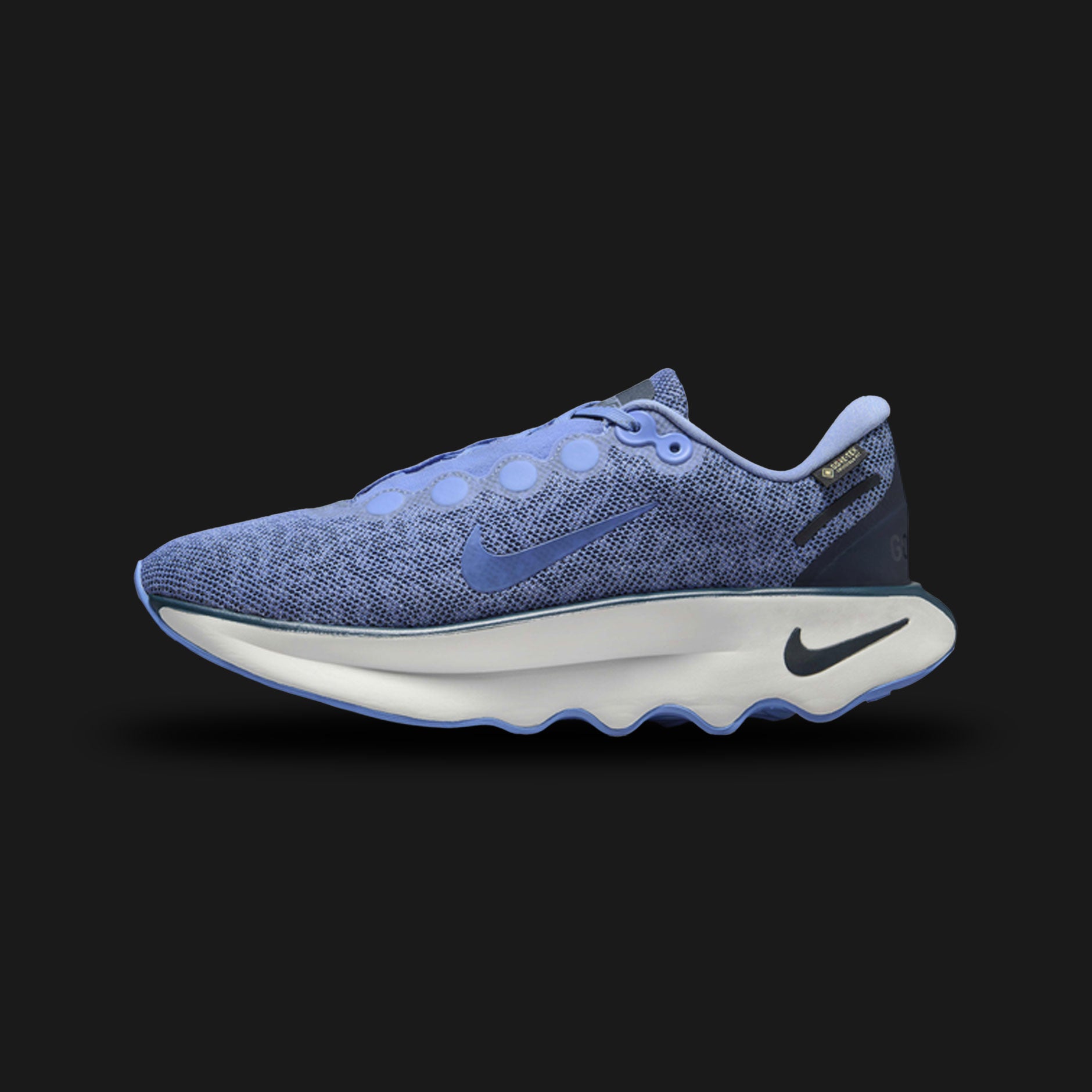 Nike Motiva GORE-TEX shoes in Royal Pulse, Cobalt Bliss, and Armoury Navy (HM0355-401). Features a waterproof GORE-TEX membrane, an exaggerated rocker sole for smooth movement, and soft Comfortgroove foam cushioning. Luxuntique guarantees 100% authentic "Nike" performance footwear in Sri Lanka.