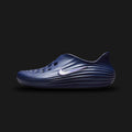 Nike ReactX Rejuven8 shoes in Blue Void and Indigo Burst (HV5060-403). Features a highly breathable Blue Void seamless inner bootie encased in a signature geometric TPU lattice cage for structural support. Includes a plush, high-energy return ReactX foam midsole in Indigo Burst and a durable rubber outsole. Luxuntique offers 100% authentic Nike in Sri Lanka.