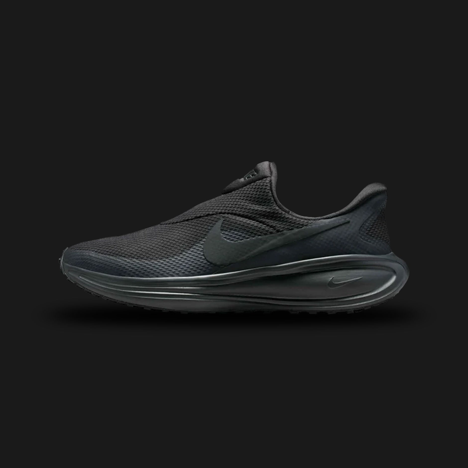 Nike Revolution 8 EasyOn running shoes in Anthracite and Black (HQ2414-003). Features a highly breathable, translucent Anthracite mesh upper. Includes Nike's hands-free EasyOn collapsible heel technology for quick slip-in access without lacing, a plush foam midsole with rocker geometry, and a flexible Black rubber outsole. Luxuntique offers 100% authentic Nike in Sri Lanka.