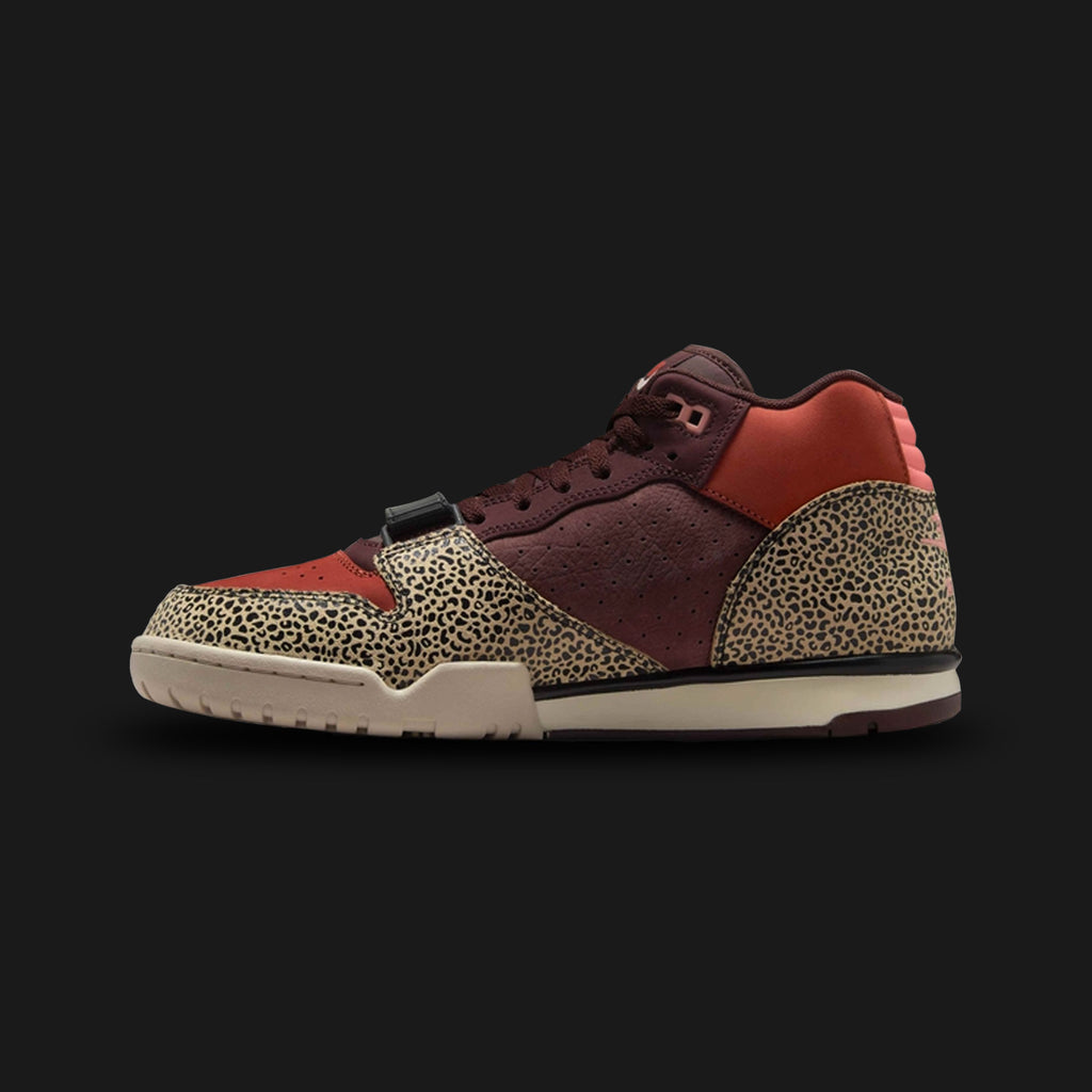 Nike SB Air Trainer 1 skate shoes in Limestone, Earth, Dusty Peach, and Pink Quartz (IF0501-200). Features a durable Limestone and Earth suede and leather upper with the iconic forefoot lockdown strap. Includes subtle Dusty Peach and Pink Quartz accents, an upgraded SB foam midsole with Zoom Air cushioning, and a grippy rubber outsole. Luxuntique offers 100% authentic Nike footwear in Sri Lanka.