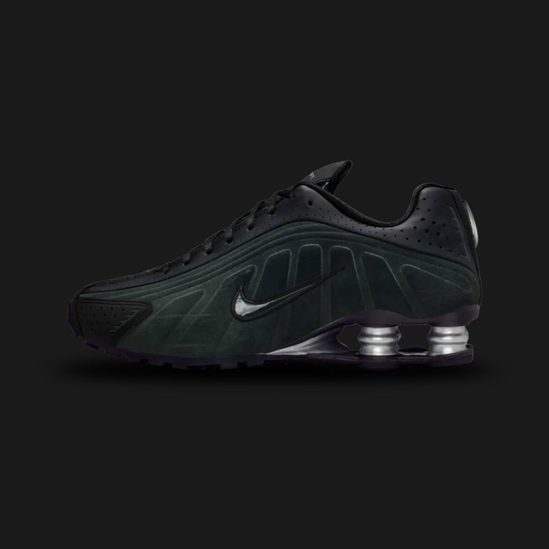 Nike Shox R4 in Black, Metallic Silver, and Seaweed (HQ7739-002). Synthetic upper with dark Seaweed panels, striking Metallic Silver overlays, and signature four-pillar Shox heel cushioning in Black. Luxuntique offers 100% authentic Nike footwear in Sri Lanka.