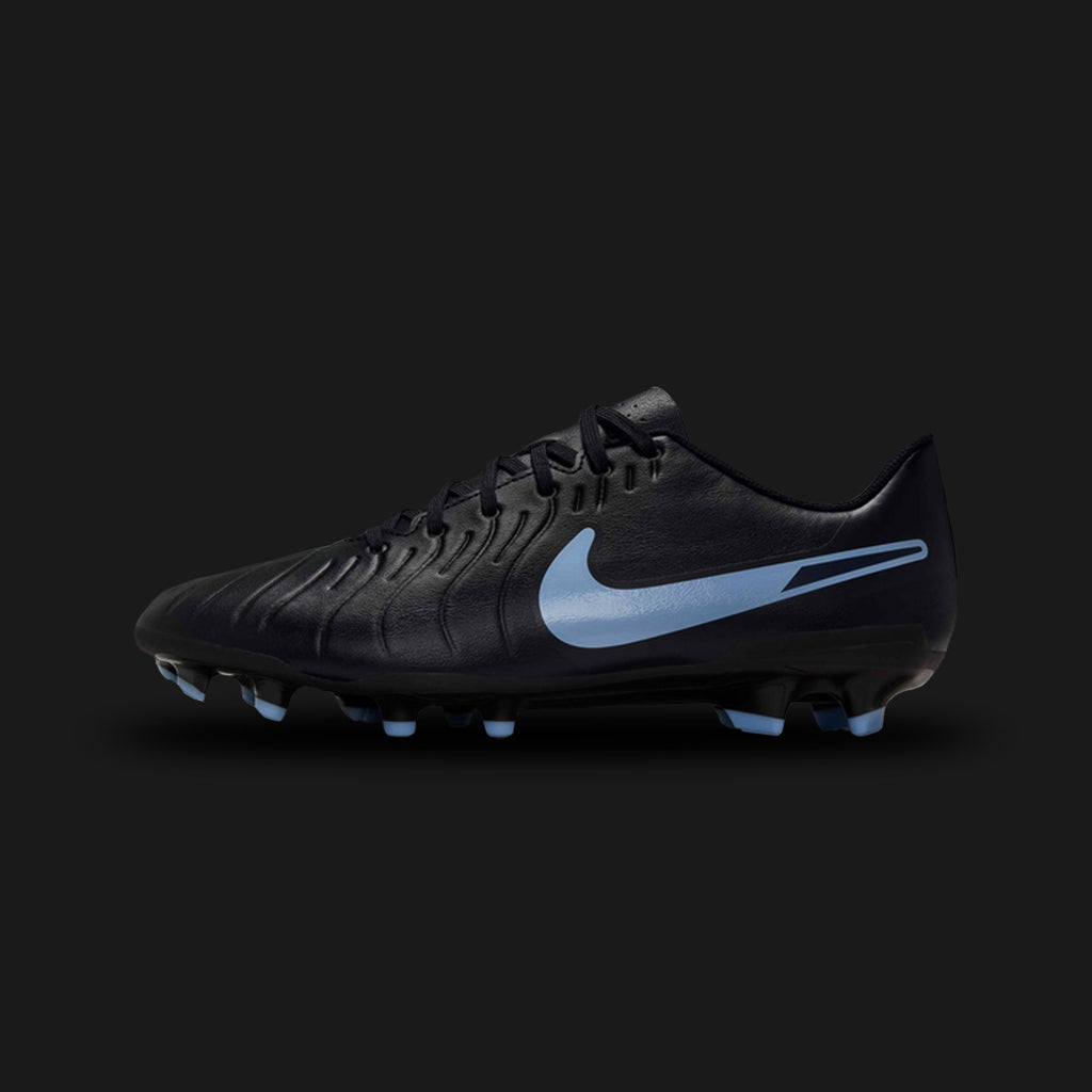Nike Tiempo Legend 10 Club MG football boots in a stealthy Black and Black colorway (DV4344-003). Features a molded synthetic leather upper with micro-dot texturing for enhanced touch and durability. Includes a comfortable padded collar, a classic lace-up design, and a versatile multi-ground (MG) soleplate with conical studs for traction on natural and artificial grass. Luxuntique guarantees 100% authentic Nike footwear in Sri Lanka.