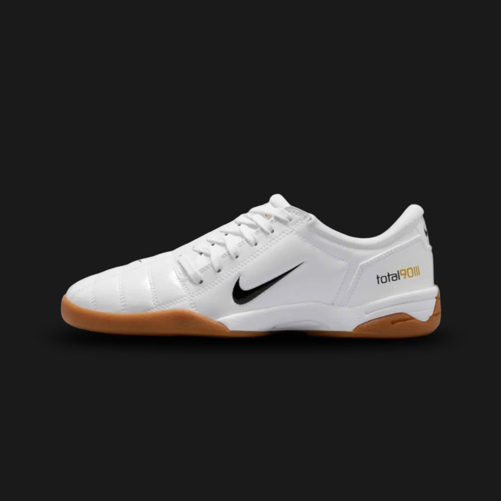 Nike Total 90 III sneakers in White and Metallic Gold (IB5666-100). Premium white leather upper featuring the iconic asymmetrical lacing system and a bold Metallic Gold circular 90 logo. Finished with black accents and a retro football-inspired silhouette. Luxuntique offers 100% authentic Nike footwear in Sri Lanka.