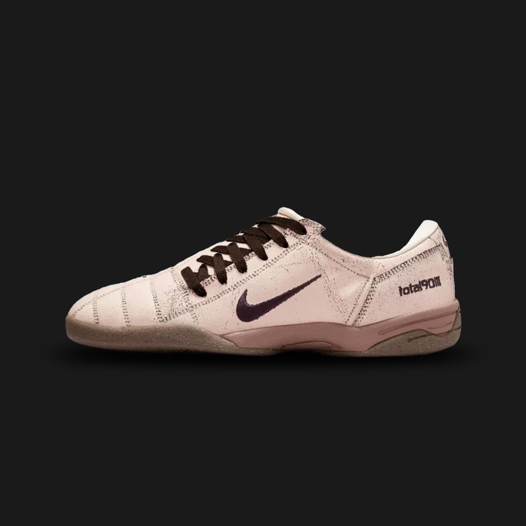 Nike Total 90 Premium lifestyle shoes in Pearl White, Gum Dark Brown, and Shadow Brown (IH2090-200). Features the iconic early 2000s asymmetrical lacing system and a premium Pearl White synthetic and leather upper with classic ribbed texturing. Includes elegant Shadow Brown accents and a durable Gum Dark Brown traction outsole. Luxuntique offers 100% authentic Nike footwear in Sri Lanka.