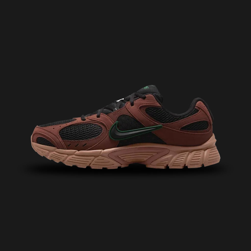 Nike V5 RNR shoes in Black, Fauna Brown, and Archaeo Brown (II6292-003). Features a breathable Black mesh upper reinforced with rugged Fauna Brown and Archaeo Brown suede and synthetic overlays. Includes a durable structural midfoot cage, a thick responsive foam midsole for all-day comfort, and an aggressive Black rubber traction outsole. Luxuntique offers 100% authentic Nike in Sri Lanka.