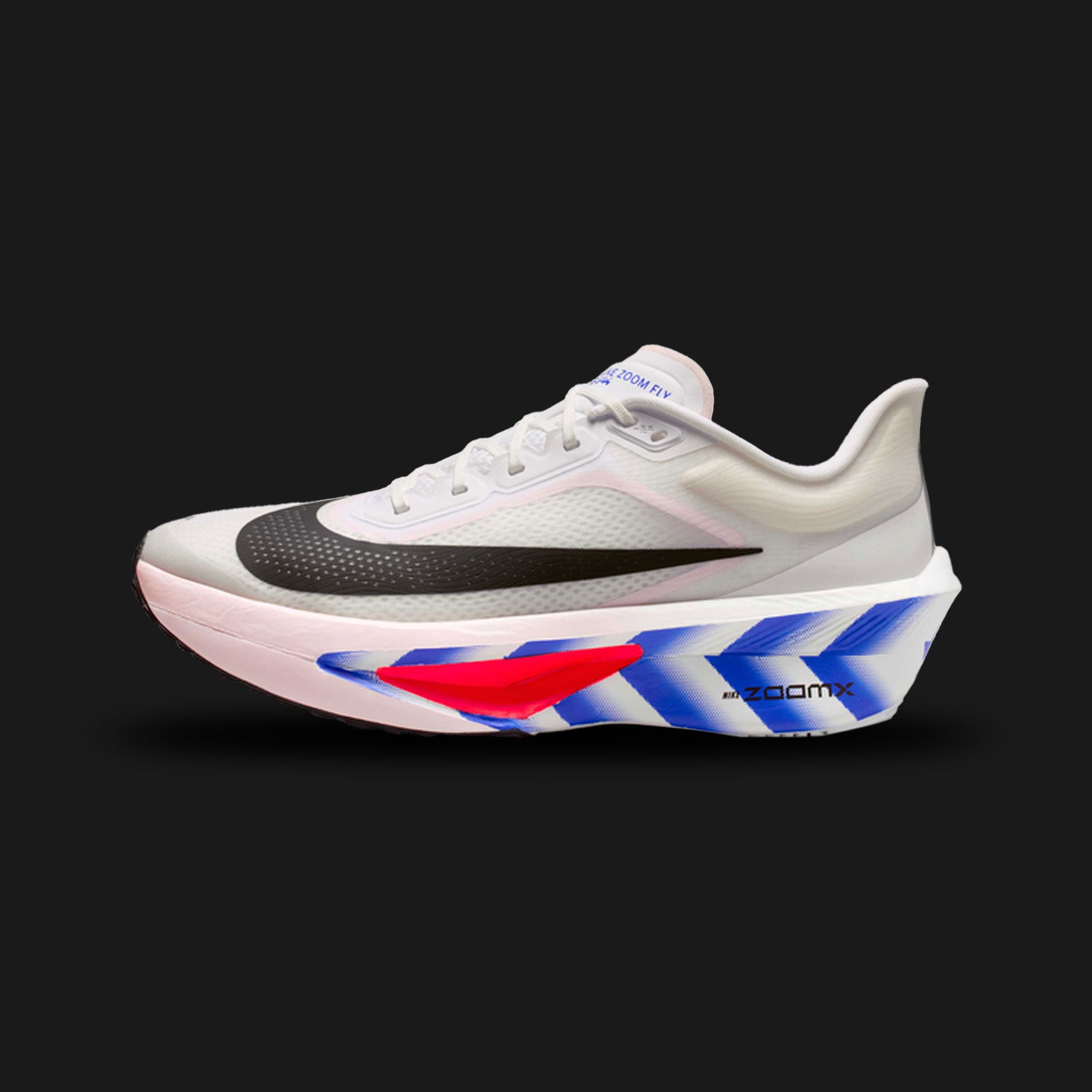 Nike Zoom Fly 6 running shoes in White, Silt Red, Racer Blue, and Black (II7285-100). Features a lightweight, highly breathable white woven upper with striking Racer Blue and Silt Red accents. Includes a high-stack ZoomX foam midsole with an embedded carbon fiber Flyplate for maximum propulsion, finished with a grippy black rubber outsole. Luxuntique offers 100% authentic Nike in Sri Lanka.