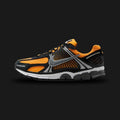 Orange and black Nike Zoom Vomero 5 sneaker (Design code: NKIF6211-700). Luxuntique offers 100% authentic Nike tech-runner sneakers at the lowest prices in Sri Lanka.