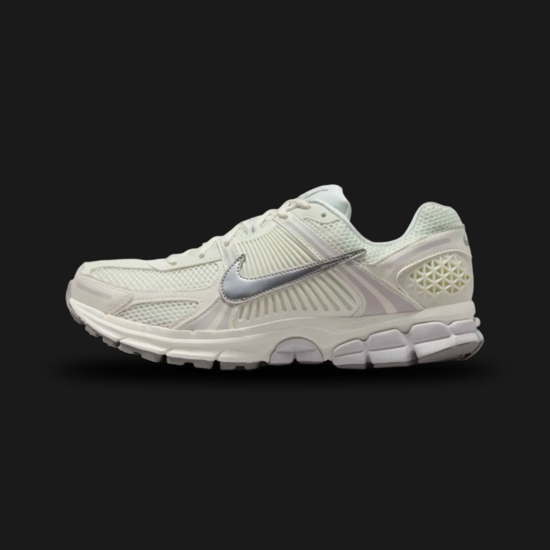 Nike Zoom Vomero 5 retro running shoes in Sail, Vast Grey, College Grey, and Metallic Silver (Design Code: FB9149-103). Featuring a richly layered Sail and Vast Grey upper combining breathable mesh, synthetic suede, and leather overlays. Accented with signature plastic side caging, reflective Metallic Silver detailing, and supported by a Cushlon foam midsole with responsive Zoom Air cushioning. Luxuntique offers 100% authentic Nike lifestyle sneakers at the lowest price in Sri Lanka.