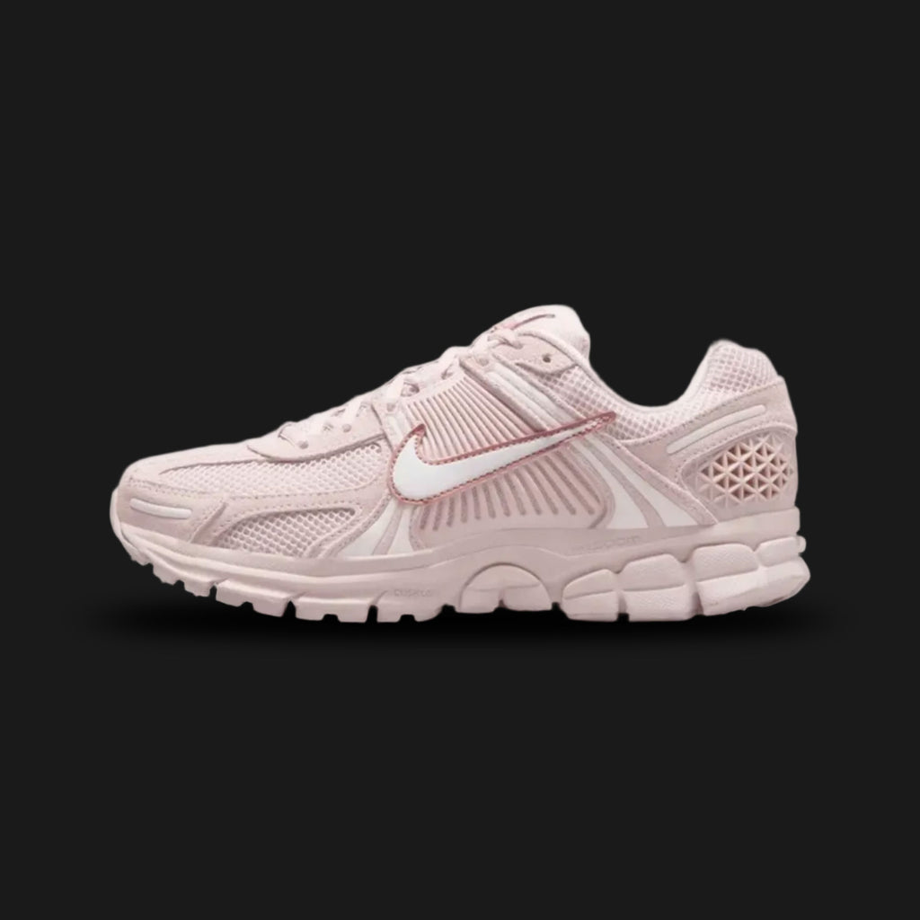 Nike Zoom Vomero 5 retro running shoes in Silt Red, Red Stardust, and Vast Grey (Design Code: HQ0458-600). Featuring a richly layered, breathable Silt Red mesh upper combined with synthetic leather overlays and signature plastic side caging in Red Stardust. Accented with Vast Grey details, reflective 3M highlights, and a comfortable Cushlon foam midsole equipped with responsive Zoom Air cushioning. Luxuntique offers 100% authentic Nike lifestyle sneakers at the lowest price in Sri Lanka.